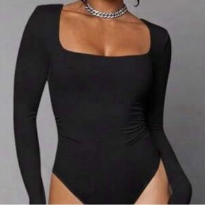 black long sleeve body suit